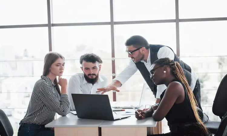 a group of multinational busy people working in the office